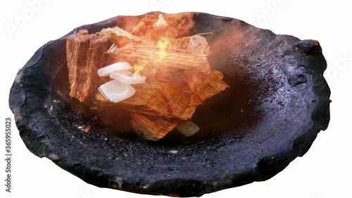 4K video of the fire on the small pieces of wood and Camphor Tablets (known as Karpoor or karpur in hindi) during the worship of god in Hindu kept in the clay pot.