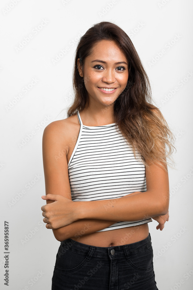 Happy young beautiful Asian woman with brown hair Happy young beautiful Asian woman with brown hair