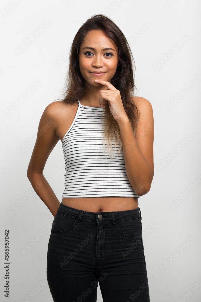 Portrait of young beautiful Asian woman with brown hair Portrait of young beautiful Asian woman with brown hair