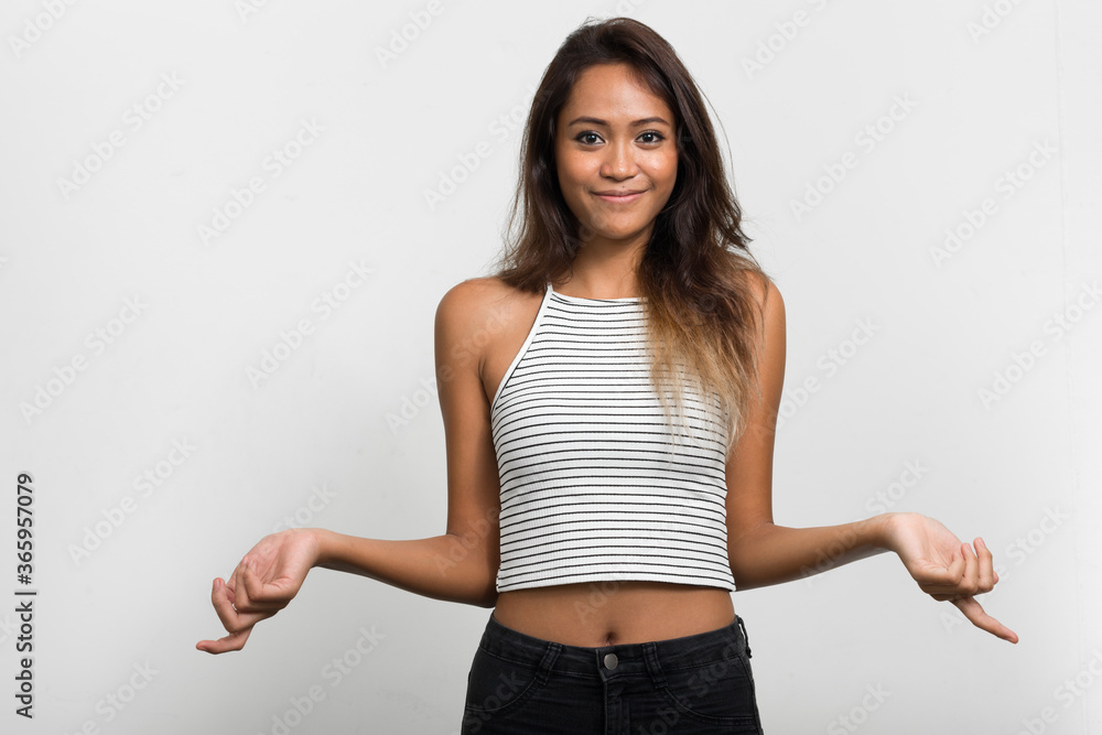 Portrait of young beautiful Asian woman with brown hair Portrait of young beautiful Asian woman with brown hair