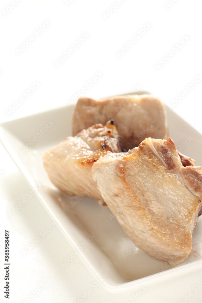 prepared pan fried belly pork on dish with copy space prepared pan fried belly pork on dish with copy space