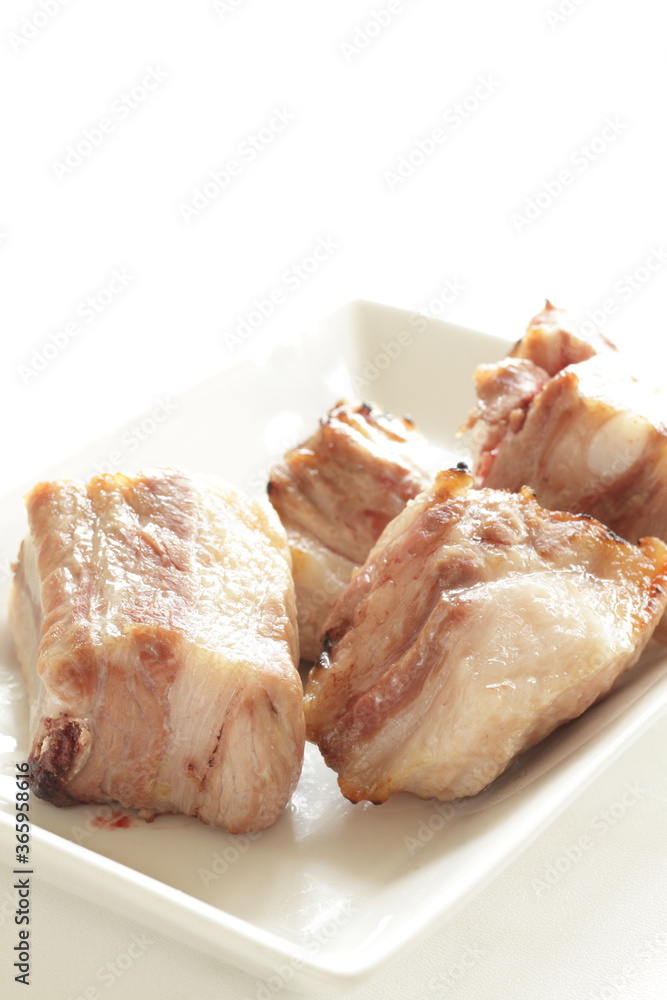 prepared pan fried belly pork on dish with copy space prepared pan fried belly pork on dish with copy space
