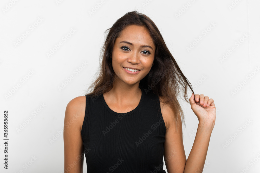 Happy young beautiful Asian woman with brown hair Happy young beautiful Asian woman with brown hair
