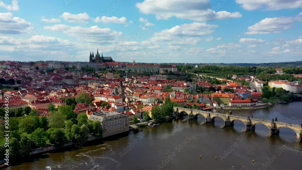 Panoramic view from above on the Prague center, aerial of the Prague city, view from above on the cityscape of Prague, flight over the city, top view, Vltava River, Charles Bridge, Prague, Czechia. Panoramic view from above on the Prague center, aerial of the Prague city, view from above on the cityscape of Prague, flight over the city, top view, Vltava River, Charles Bridge, Prague, Czechia.