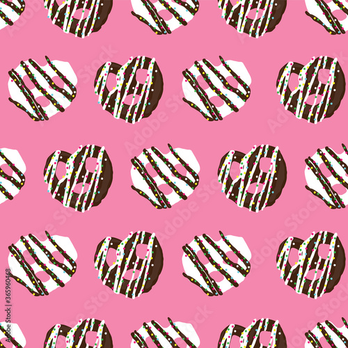 chocolate covered pretzel and sprinkles seamless pattern on pink background design