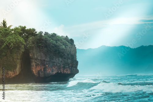 The beauty of the sunset with the beautiful color of the sky on the Pelang beach, Tulungagung, East Java, Indonesia photo