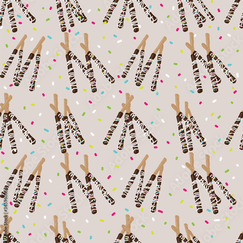 chocolate covered stick pretzels and sprinkles seamless pattern on beige background design