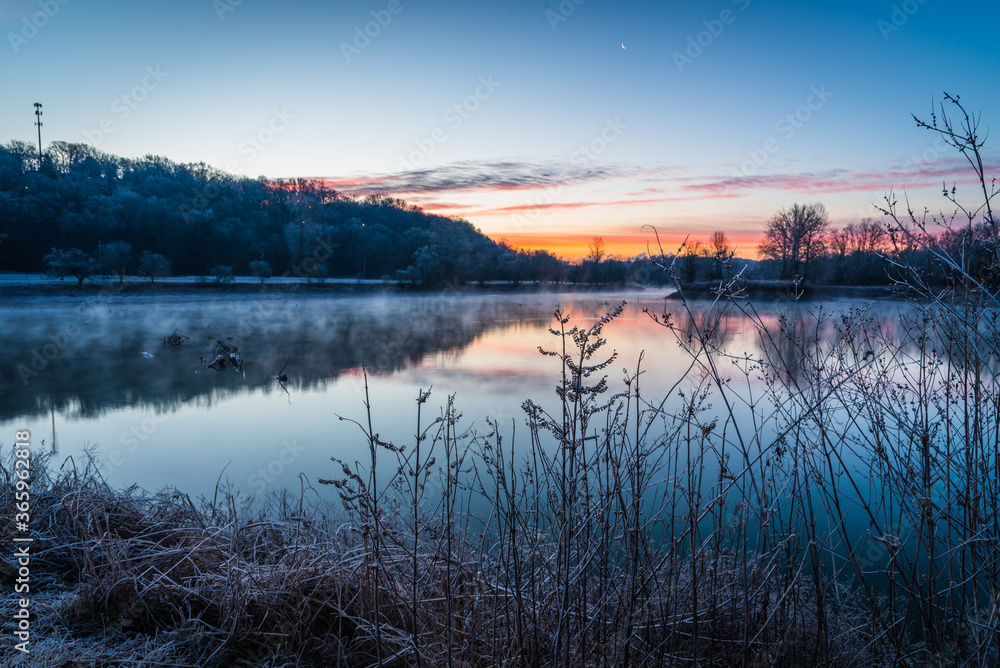 sunrise over the lake in winter