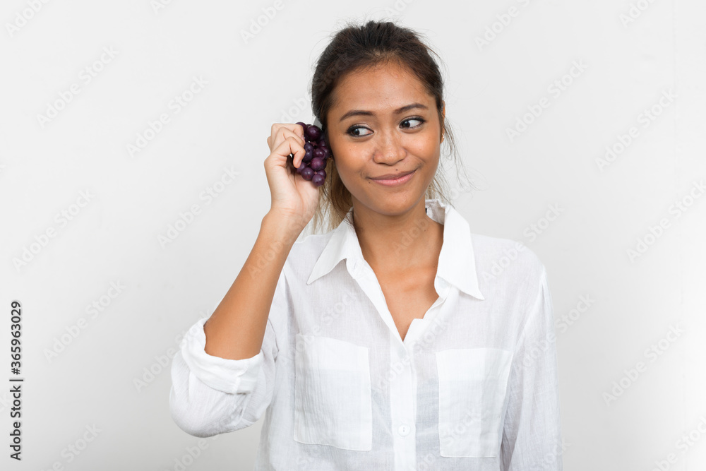 Portrait of young beautiful Asian businesswoman with brown hair Portrait of young beautiful Asian businesswoman with brown hair