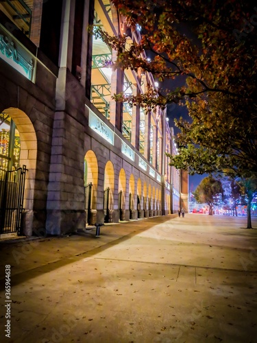 City sidewalk at night in Arlington Texas photo