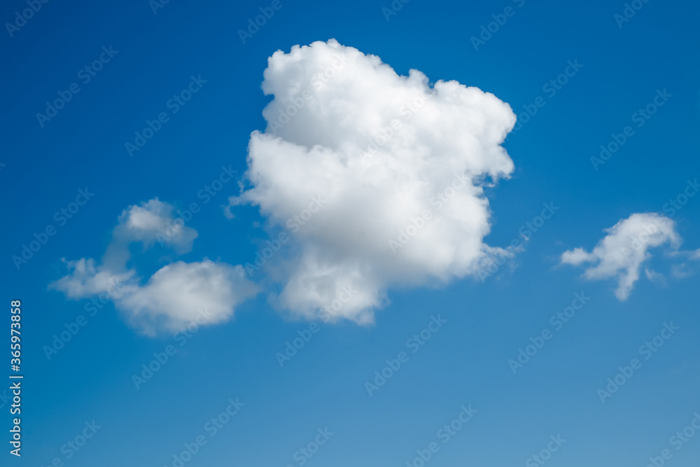 White, Fluffy Clouds In Blue Sky. Background From Clouds. White, Fluffy Clouds In Blue Sky. Background From Clouds.