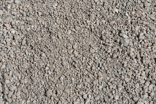Small gray crushed stone crushed. Abstract background.