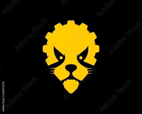 Yellow lion head and gear photo