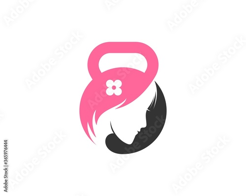 Pink and black kettle bell with beauty face inside