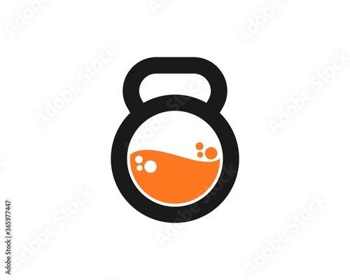 Black kettle bell with orange liquid inside