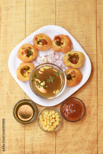 Wallpaper Mural Three glasses of various milkshakes.Strawberry, chocolate and vanilla milkshake on wooden  background Torontodigital.ca