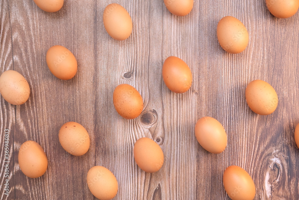 Close up chicken egg on wooden table background and space for text Close up chicken egg on wooden table background and space for text