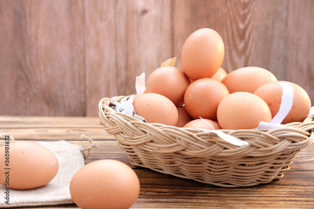 Close up chicken egg on wooden table background and space for text Close up chicken egg on wooden table background and space for text