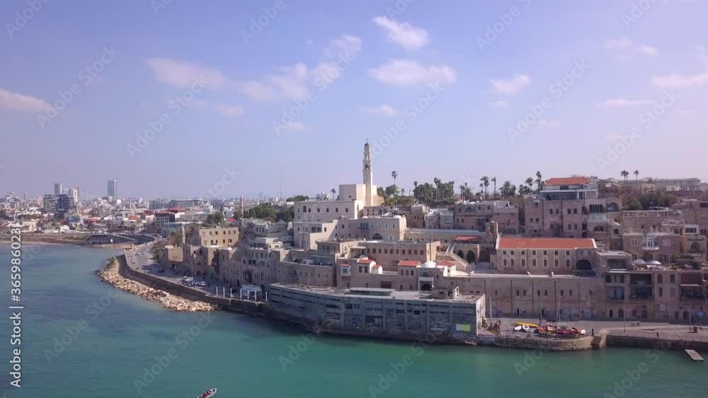 Tel Aviv and Jaffa skyline, aerial view above the old city and port of Jaffa and TLV coastline in the background. Tel Aviv and Jaffa skyline, aerial view above the old city and port of Jaffa and TLV coastline in the background.