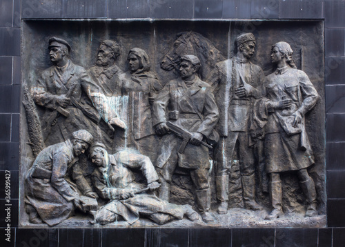 A sculptural composition in the style of socialist realism. A bas-relief of the times of the USSR on the theme of the Second World War.