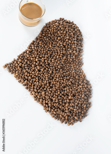 coffee beans lay on white background. from top view.