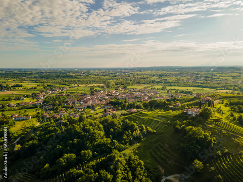 Aerial view of Friuli Venezia Giulia hills and mountains in Italy, Savorgnano del Torre, Italian wine countryside, vineyards at sunset, Udine Province 