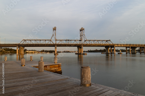 Canvas Print Wooden pier and Ryde Bridge view, Sydney, Australia.