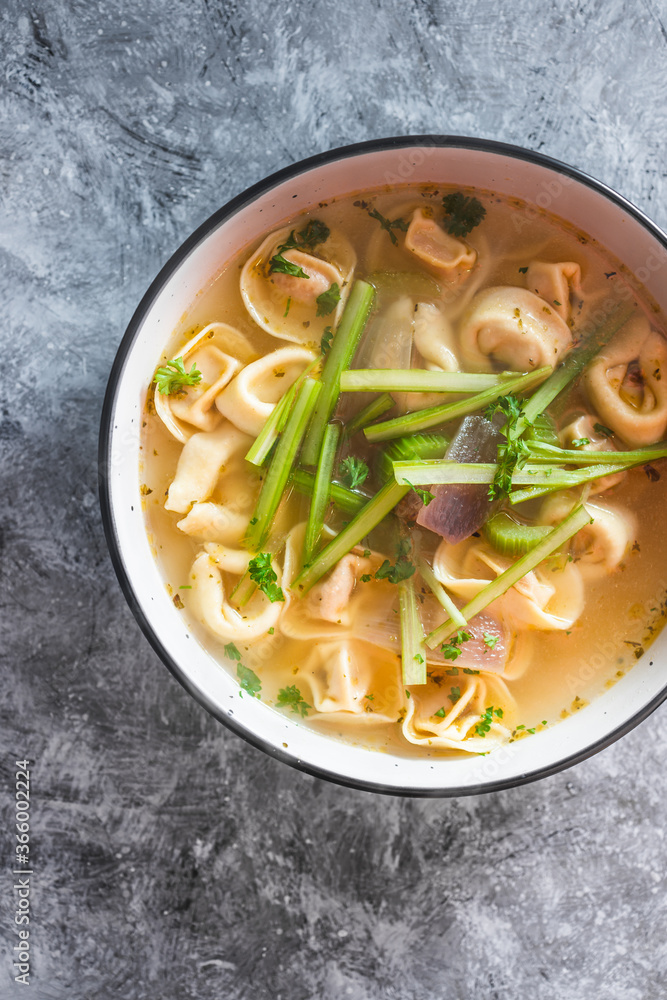 plant-based food, vegan ravioli pasta with vegetable broth and celeri plant-based food, vegan ravioli pasta with vegetable broth and celeri