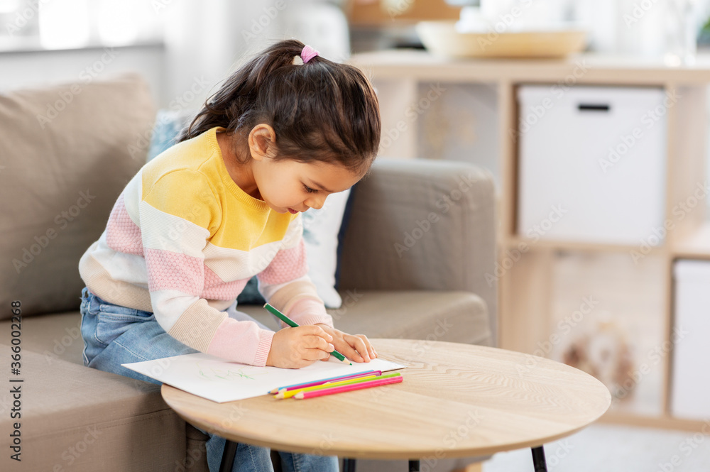 childhood, creativity and art concept - little girl drawing with coloring pencils at home childhood, creativity and art concept - little girl drawing with coloring pencils at home