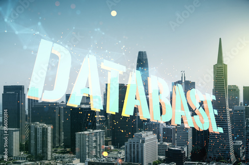Double exposure of creative Database word hologram on San Francisco city skyscrapers background, research and development concept