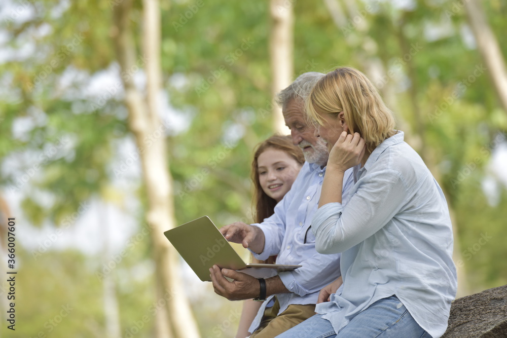 happy family of father, mother and daughter in park . Family and Insurance concept. happy family of father, mother and daughter in park . Family and Insurance concept.