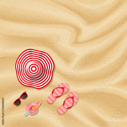 Summer time. Sand texture. Top view. Hat, sunglasses, flip flops, cocktail. View from above. 