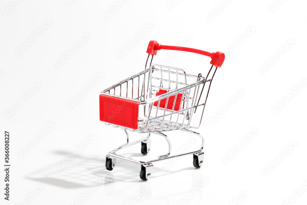 Cart is empty from the supermarket on a white background. Online shopping for buyers concept. Cart is empty from the supermarket on a white background. Online shopping for buyers concept.