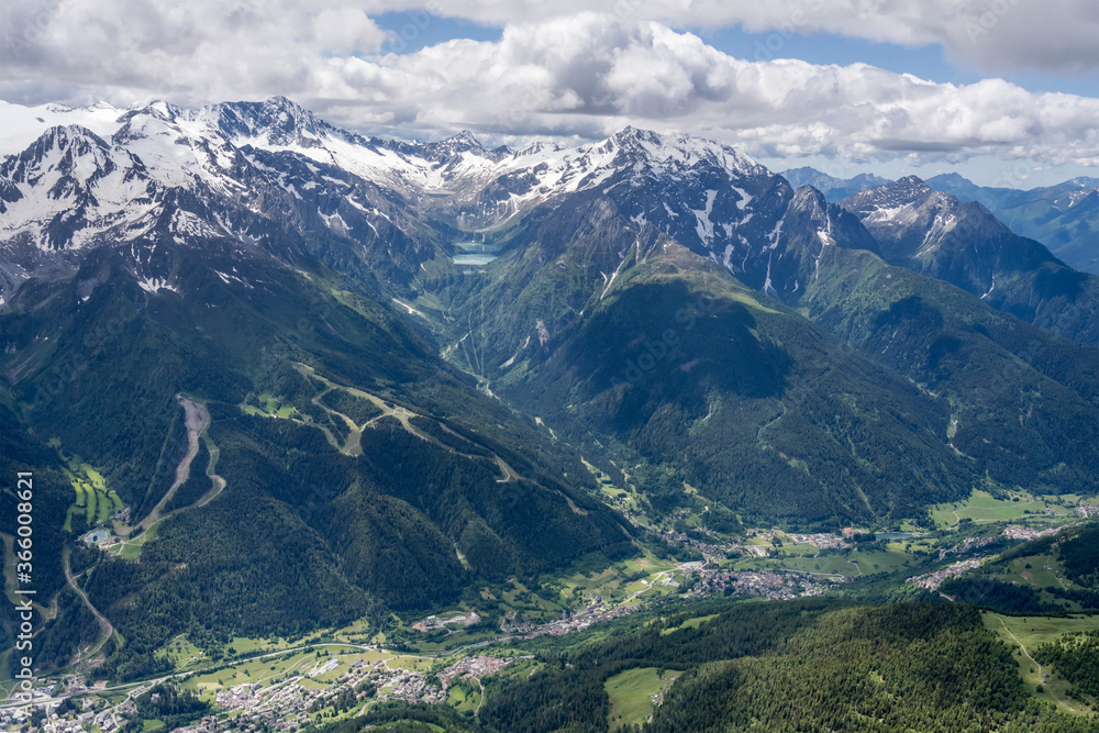 Avio range and valley over Temu village in Camonica valley in  late spring, Alps, Italy