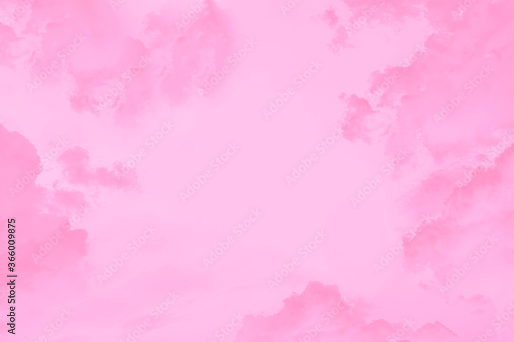 Pink clouds in the light pink sky, copy space