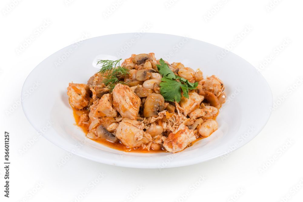 Beans with mushrooms and chicken, stewed in tomato sauce, closeup Beans with mushrooms and chicken, stewed in tomato sauce, closeup