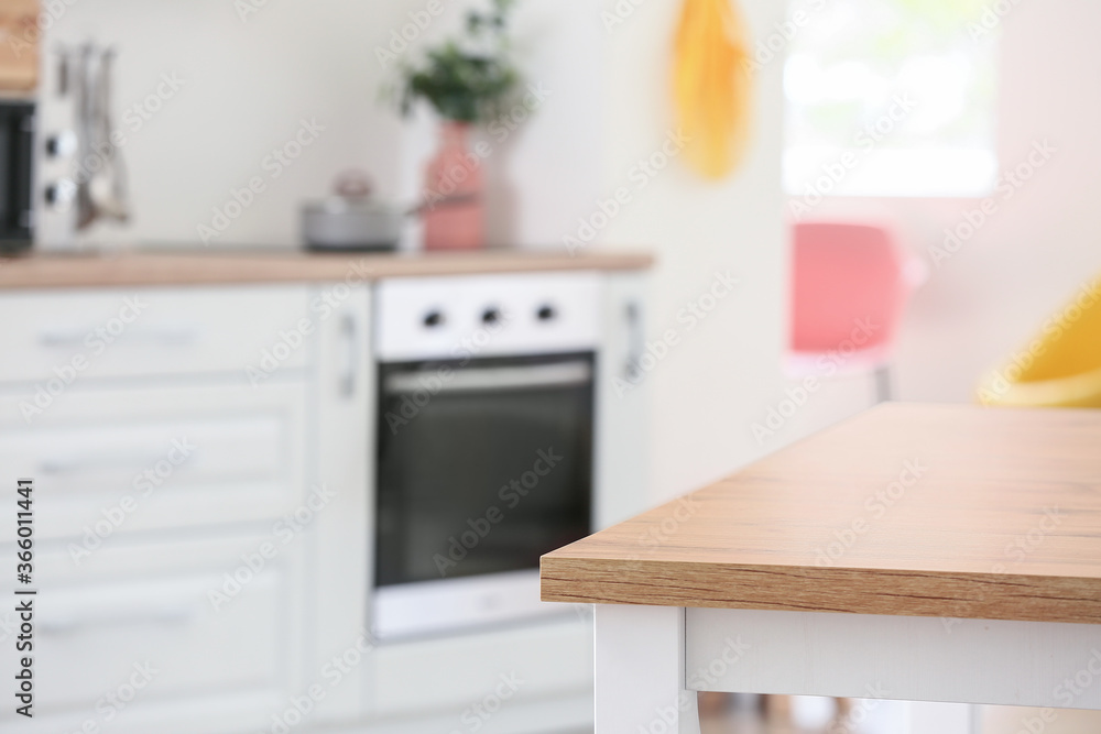 Clean table in interior of modern kitchen Clean table in interior of modern kitchen