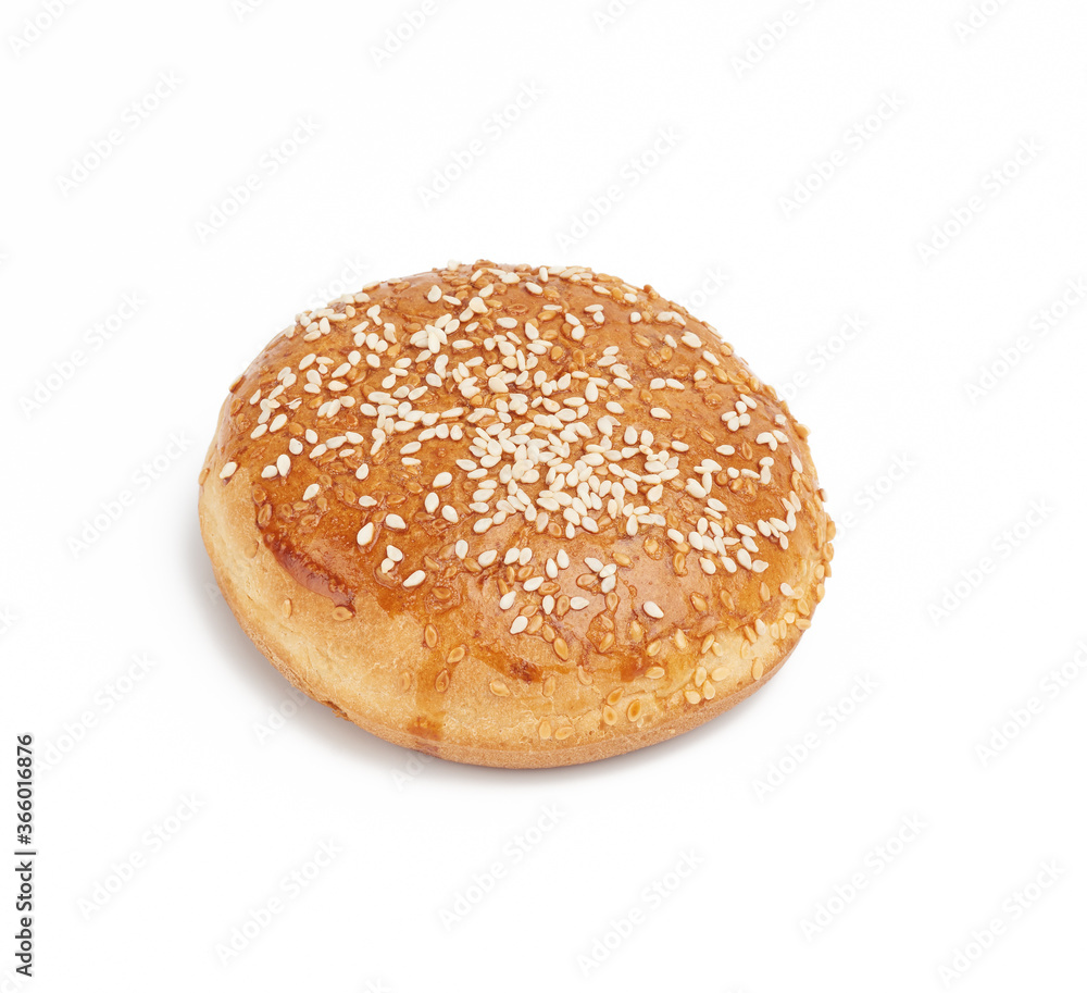 baked round bun with sesame seeds isolated on white background