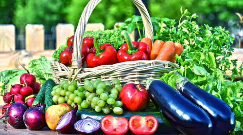 Fototapeta Naklejka Na Ścianę i Meble -  Variety of fresh organic vegetables in wicker basket
