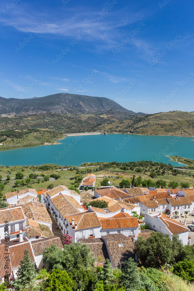 Zahara de la Sierra village at the lake in Grazalema natural park ...
