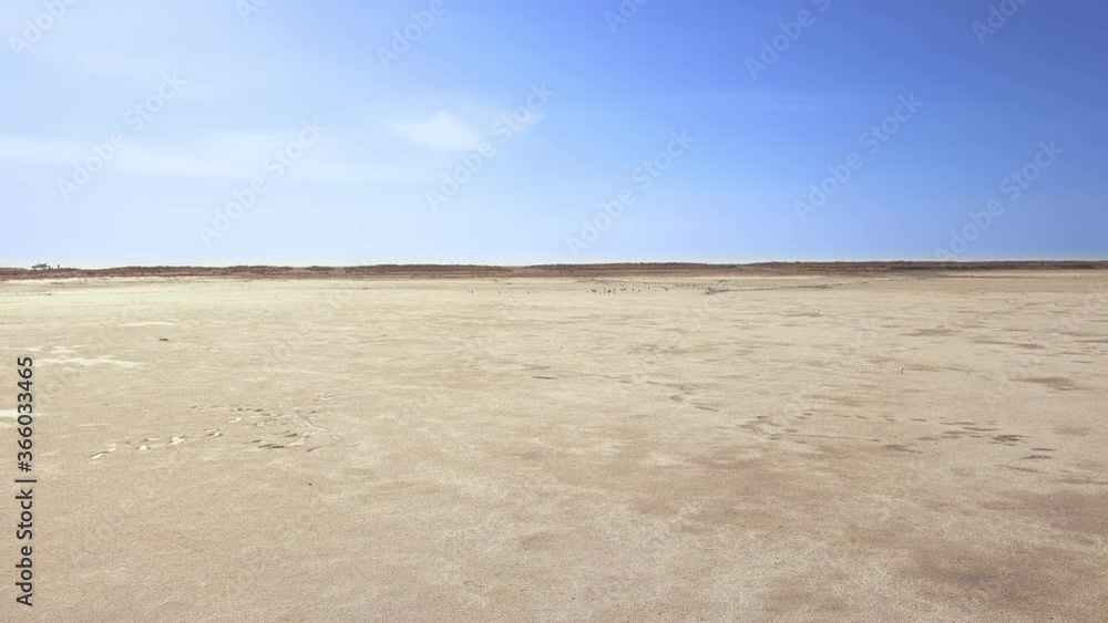 A Dust Devil whirls through the Australian outback with a birds eye view from a drone. A Dust Devil whirls through the Australian outback with a birds eye view from a drone.