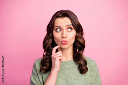 Portrait of minded pensive girl look copyspace think thoughts decide decisions choose choice solution touch chin fingers wear sweater pullover isolated over pastel color background