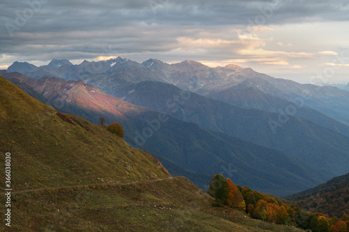 autumn mountains lit by the evening sun