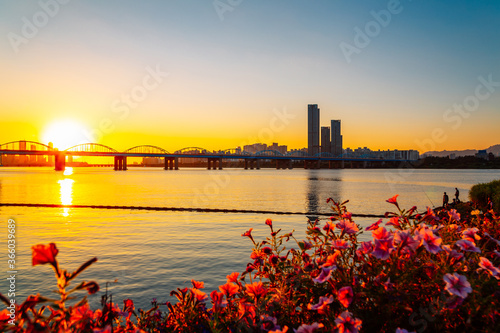 Sunset of Dongjak Bridge and Seoul city with Han River from Banpo Hangang Park in Seoul, Korea photo