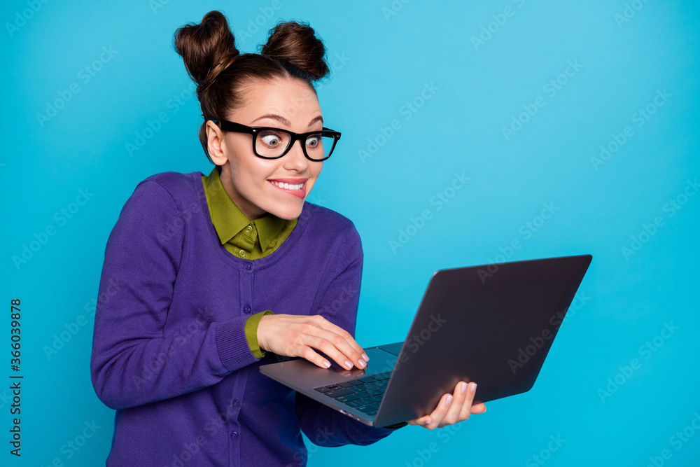 Close-up portrait of nice attractive smart clever comic childish cheery foxy girl holding in hands laptop writing e-mail isolated bright vivid shine vibrant blue green teal turquoise color background Close-up portrait of nice attractive smart clever comic childish cheery foxy girl holding in hands laptop writing e-mail isolated bright vivid shine vibrant blue green teal turquoise color background