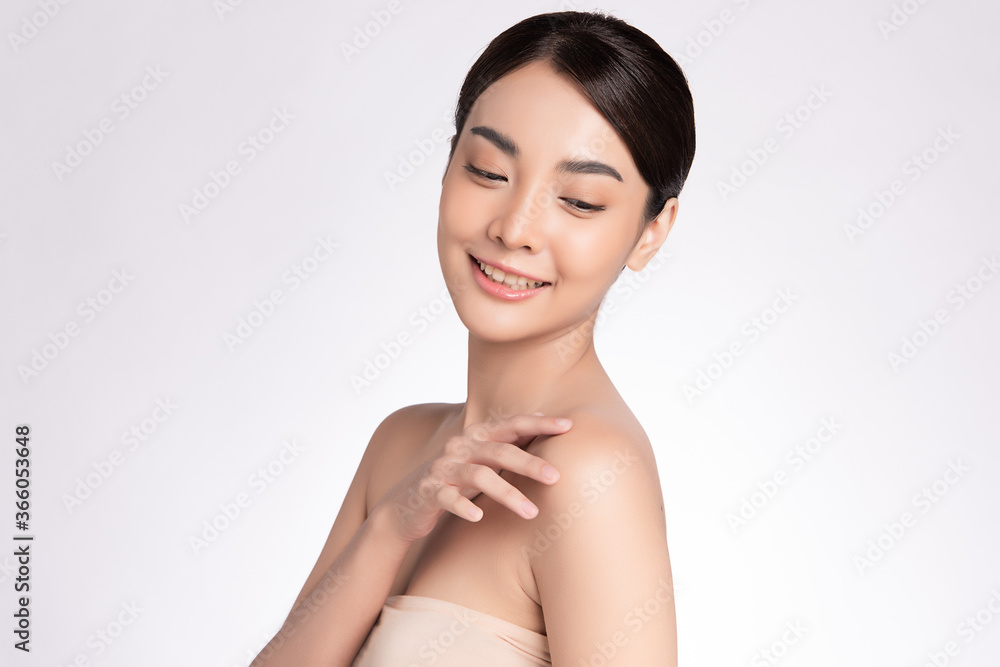 Beautiful Young asian Woman with Clean Fresh Skin, on white background, Face care, Facial treatment, Cosmetology, beauty and spa, Asian women portrait Beautiful Young asian Woman with Clean Fresh Skin, on white background, Face care, Facial treatment, Cosmetology, beauty and spa, Asian women portrait