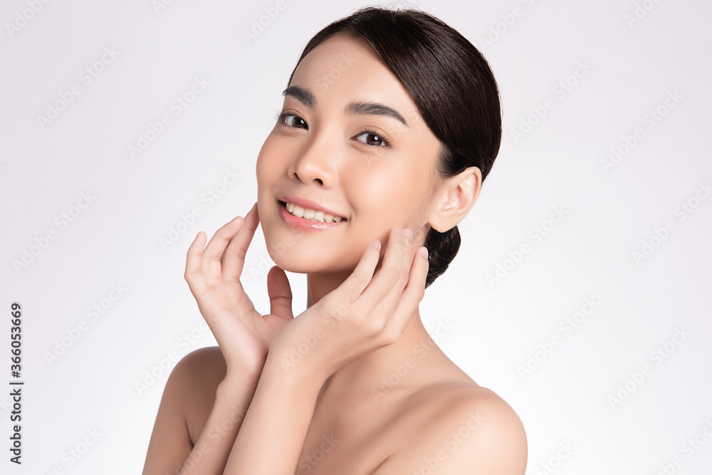 Beautiful Young asian Woman with Clean Fresh Skin, on white background, Face care, Facial treatment, Cosmetology, beauty and spa, Asian women portrait Beautiful Young asian Woman with Clean Fresh Skin, on white background, Face care, Facial treatment, Cosmetology, beauty and spa, Asian women portrait