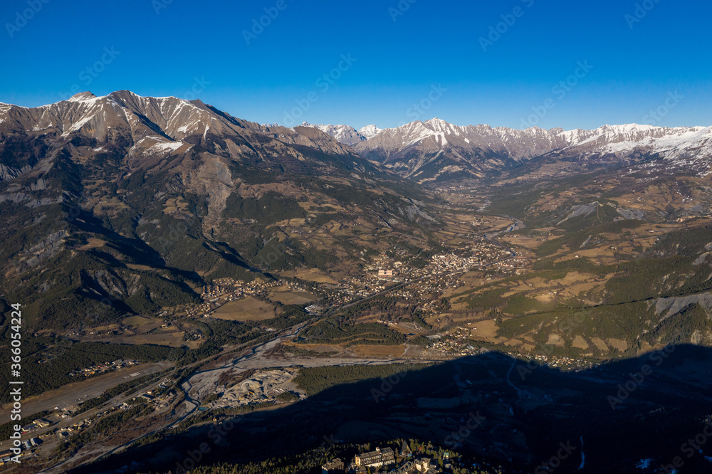 Sky view of mountains and a village, Uvernet-Fours, aples-de-haute-provence