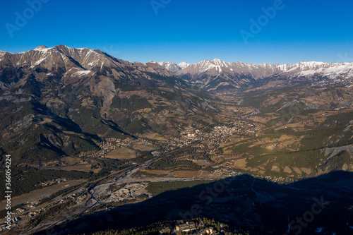 Sky view of mountains and a village, Uvernet-Fours, aples-de-haute-provence