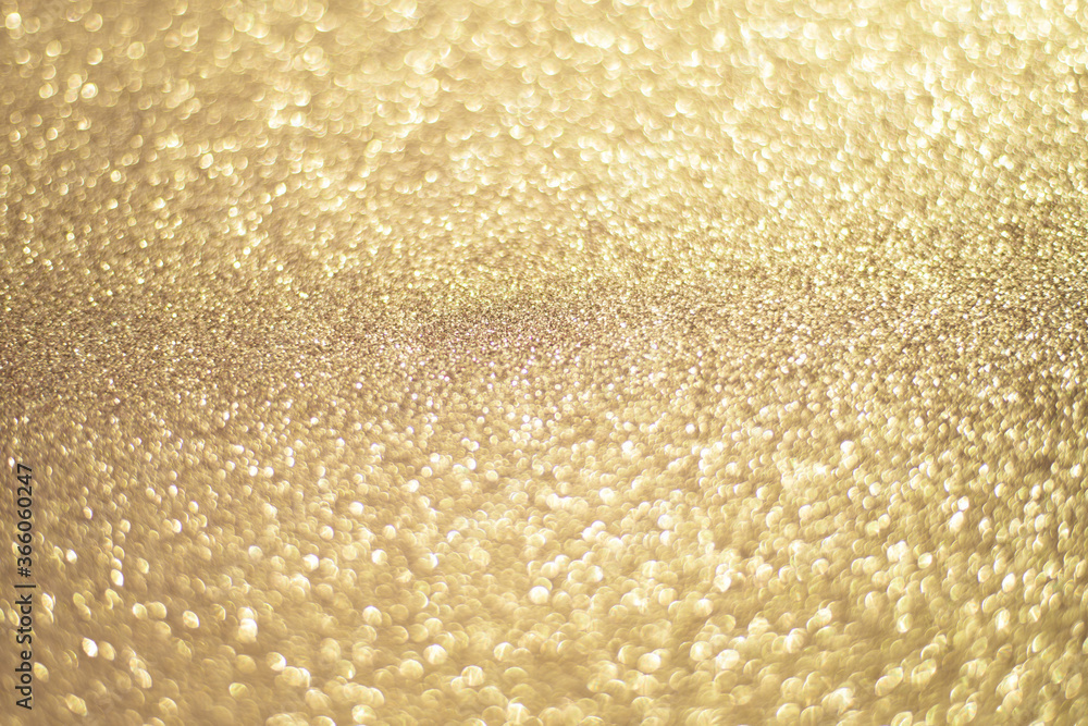 Sparkling gold bokeh background, gold color. Gold sequins background. Sparkling gold bokeh background, gold color. Gold sequins background.